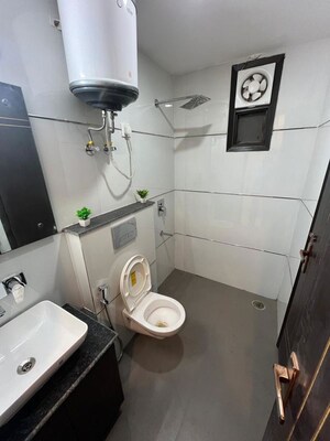 Bathroom in 3 BHK Apartment at Chattarpur – for Rent