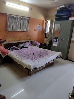 Bedroom in 2 BHK Apartment at Kamlesh Mansion Apartment, Vile Parle East – for Sale