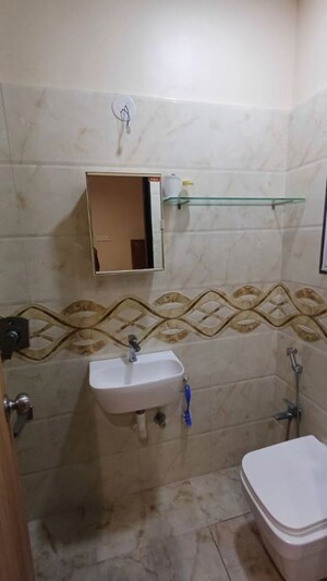 Bathroom in 2 BHK Apartment at Ssakash Shri Upendra Nagar CHSL, Dahisar East – for Sale