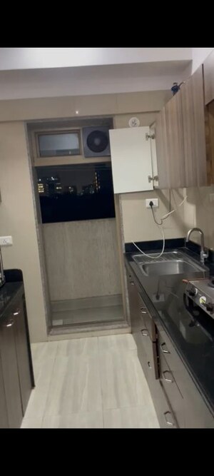 Kitchen in 2 BHK Apartment at Sheth Vasant Oasis, Andheri East – for Rent