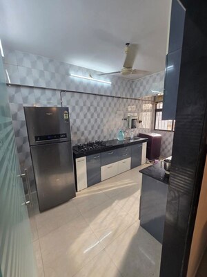 Kitchen in 3 BHK Apartment at Charmee Enclave, Vile Parle East – for Sale