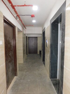 Building Lobby in 1 BHK Apartment at Sangam Veda, Andheri West – for Sale