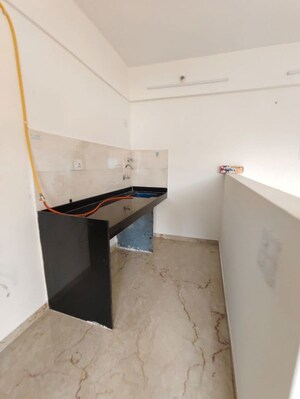Kitchen in 1 BHK Apartment at Haware Citi, Ghodbunder Road – for Rent