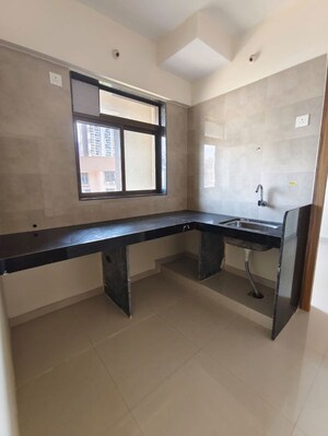 Kitchen in 1 BHK Apartment at K M Horizon Palms, Owale – for Rent