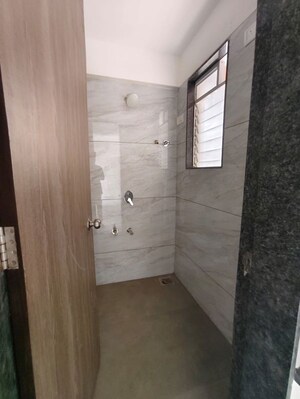 Bathroom in 1 BHK Apartment at Metropolis Bayside, Kasarvadavali – for Rent