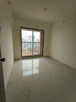 Bedroom in 1 BHK Apartment at Metropolis Bayside, Kasarvadavali – for Rent