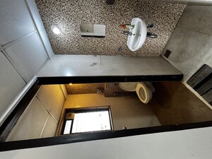 Bathroom in 1 BHK Apartment at Lodha Lakeshore Greens, Dombivli East – for Rent