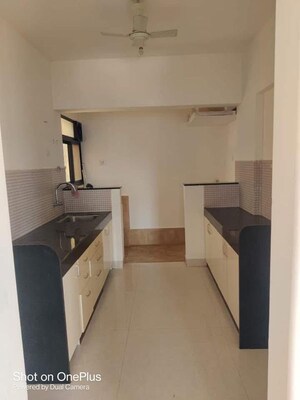 Kitchen in 2 BHK Apartment at Abhinav Pebbles Urbania, Bavdhan – for Sale