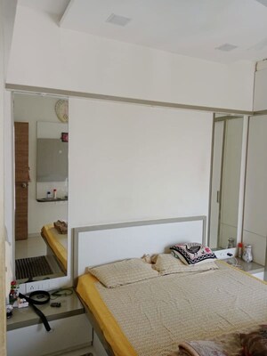 Living Room in 2 BHK Apartment at Abhinav Pebbles Urbania, Bavdhan – for Rent