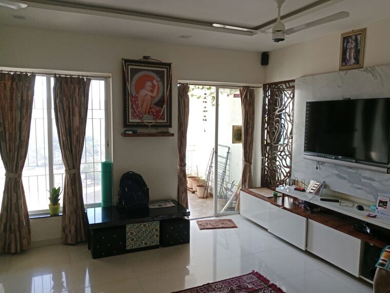 Living Room, abhinav-pebbles-urbania 2 Bedroom 750 Sq.Ft. Apartment In Bavdhan Pune 10283921