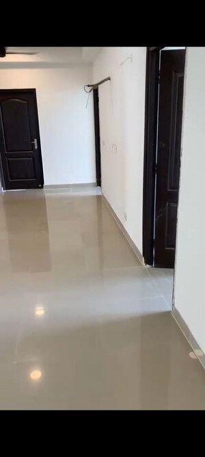 Building Lobby in 4 BHK Apartment at Gardenia Glory, Sector 46 – for Sale