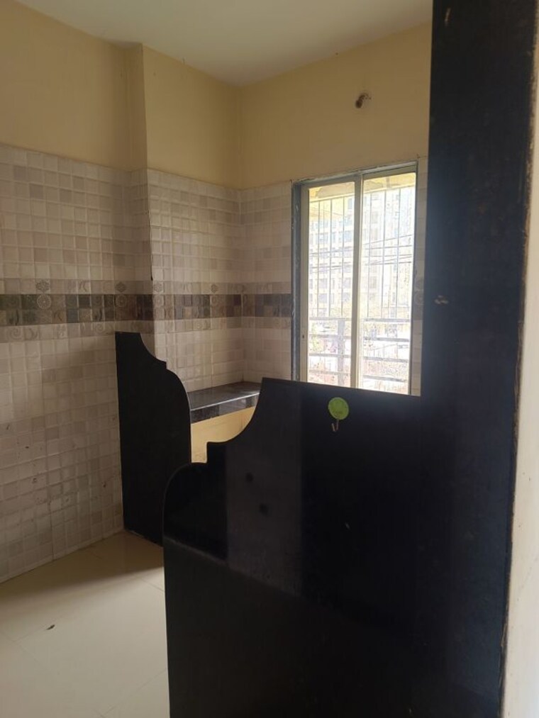 Kitchen, dreams-nirman 1 Bedroom 610 Sq.Ft. Apartment In Nalasopara West Palghar 10283964