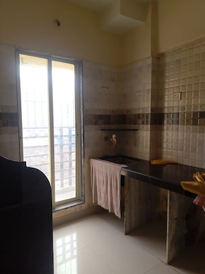 Kitchen in 1 BHK Apartment at Dreams Nirman, Nalasopara West – for Rent