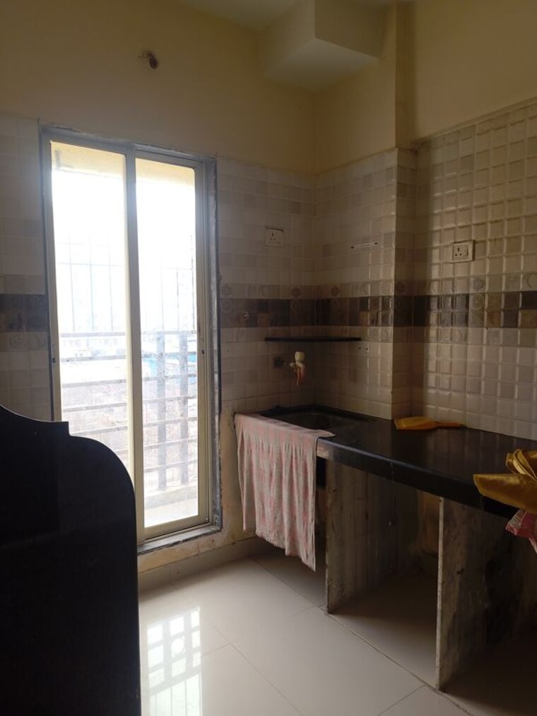 Kitchen, dreams-nirman 1 Bedroom 610 Sq.Ft. Apartment In Nalasopara West Palghar 10283964