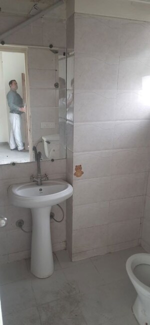 Bathroom in 2 BHK Apartment at Gaur City 5th Avenue, Sector 4 Greater Noida – for Rent