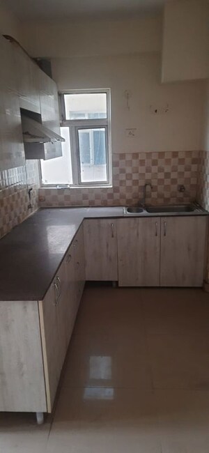 Kitchen in 2 BHK Apartment at Gaur City 5th Avenue, Sector 4 Greater Noida – for Rent
