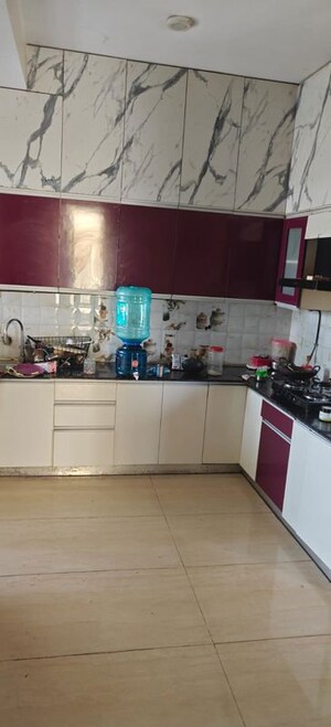 Kitchen in 3.5 BHK Apartment at Gaur Sportswood, Sector 79 – for Rent
