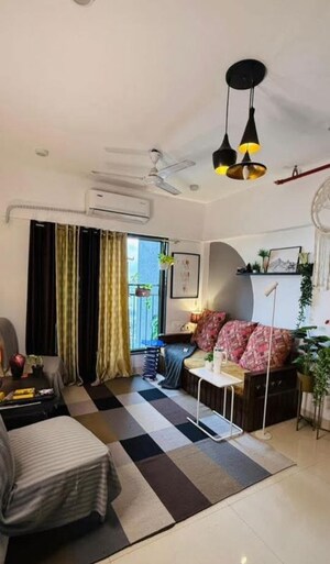 Living Room in 1 BHK Apartment at Hiranandani Gardens Canna, Powai – for Rent