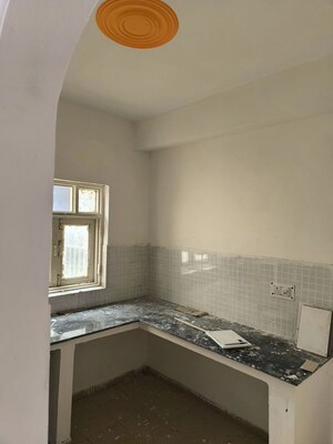 Kitchen in 2 BHK Apartment at Trehan Hill View Garden, Alwar Bypass Road – for Sale