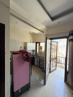 Kitchen in 2 BHK Builder Floor at Guru Nanak Enclave, Dhakoli – for Sale