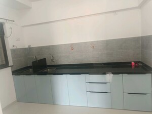 Kitchen in 2 BHK Apartment at Roshan Milestone, Tathawade – for Rent