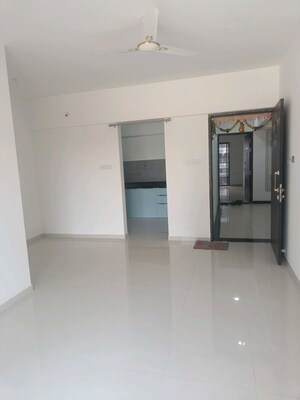 Living Room in 2 BHK Apartment at Roshan Milestone, Tathawade – for Rent