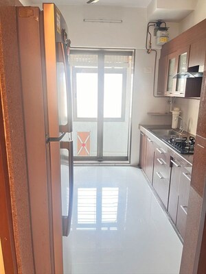 Kitchen in 2 BHK Apartment at Prakruti Pearl, Ghodbunder Road – for Rent