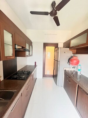 Kitchen in 2 BHK Apartment at Prakruti Pearl, Ghodbunder Road – for Rent