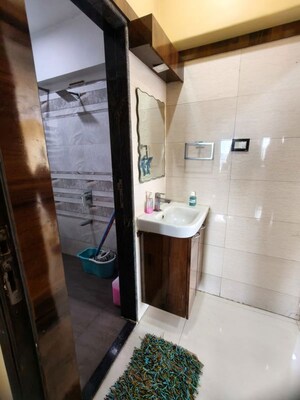 Bathroom in 2 BHK Apartment at Harsha Apartments Andheri, Andheri West – for Rent