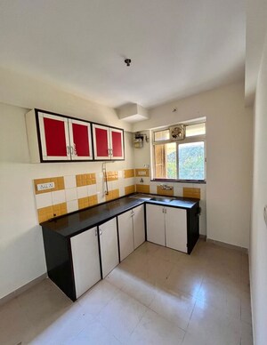 Kitchen in 2 BHK Apartment at Hiranandani Estate Hill Grange, Ghodbunder Road – for Rent