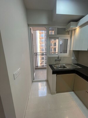 Kitchen in 3 BHK Apartment at Eldeco Live By The Greens, Sector 150 – for Rent