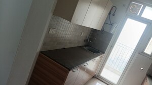Kitchen in 3 BHK Apartment at ATS Homekraft Pious Hideaways, Sector 150 – for Rent