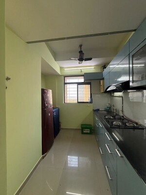 Kitchen in 1 BHK Apartment at Puranik City, Kasarvadavali – for Rent