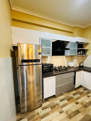 Kitchen in 4 BHK Apartment at Chandra Panorama, Sushant Golf City – for Rent