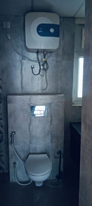 Bathroom in 3 BHK Apartment at Urban Axis Urban Woods, Sushant Golf City – for Rent