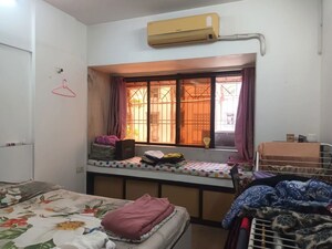 Bedroom in 1 BHK Apartment at Dheeraj Pooja, Malad West – for Sale