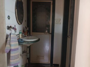 Bathroom in 1 BHK Apartment at Dheeraj Pooja, Malad West – for Sale