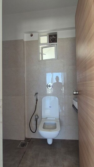 Bathroom in 2 BHK Apartment at Aastha Heights, Goregaon West – for Sale