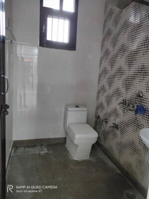 Bathroom in 3 BHK Builder Floor at Dwarka Mor – for Rent