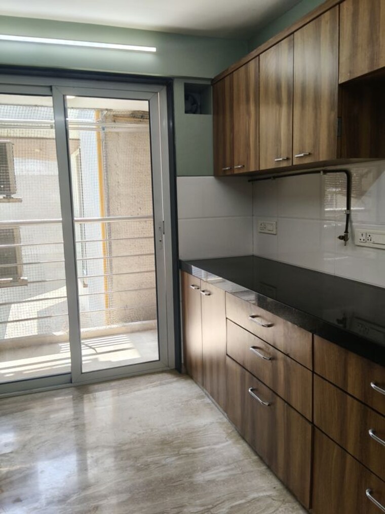 Kitchen, navratna-chs-santacruz-east 3 Bedroom 1500 Sq.Ft. Apartment In Santacruz East Mumbai 10284742