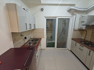 Kitchen in 3.5 BHK Apartment at Gaur Sportswood, Sector 79 – for Rent