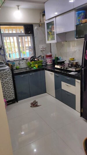 Kitchen in 2 BHK Apartment at Shraddha Paramount, Tagore Nagar – for Rent