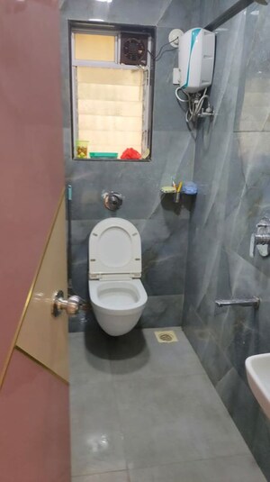 Bathroom in 2 BHK Apartment at Shraddha Paramount, Tagore Nagar – for Rent