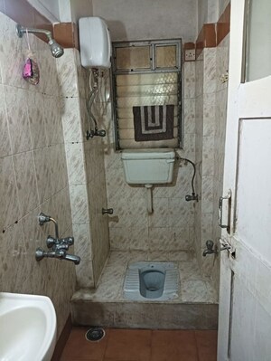 Bathroom in 3 BHK Apartment at Vasant Valley Complex, Malad East – for Rent