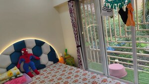 Bedroom in 2 BHK Apartment at Shraddha Paramount, Tagore Nagar – for Rent