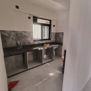 Kitchen in 1 BHK Apartment at Paradigm Antalya, Oshiwara – for Sale