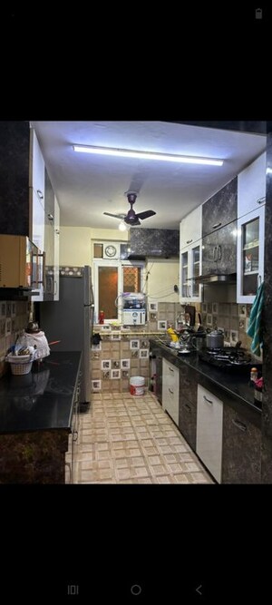 Kitchen in 3.5 BHK Apartment at Sikka Karmic Greens, Sector 78 – for Rent