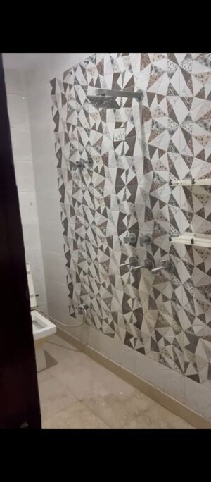 Bathroom in 3 BHK Builder Floor at Dwarka Mor – for Sale