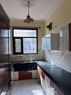 Kitchen in 3 BHK Builder Floor at Dhakoli – for Sale