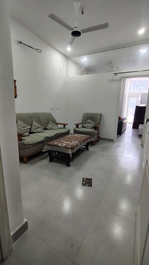 Living Room in Studio Apartment at DAH Greentech NX One, Tech Zone 4 Greater Noida – for Rent